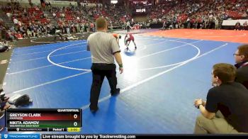 D1-138 lbs Quarterfinal - Greyson Clark, Kaukauna vs Nikita Adamov, Wauwatosa West/East