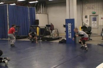Wrestlers warming up before Finals