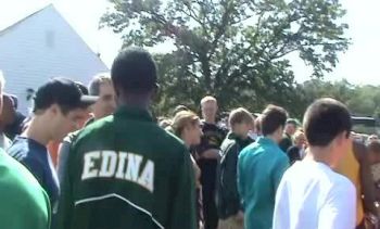 HS kids around Hassan after his race