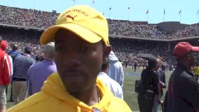 Coach of Wolmers Boys after 4x100 record