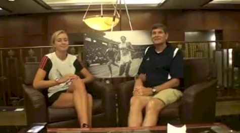 Katie Flood talks with Jim Ryun before 2010 Dream Mile