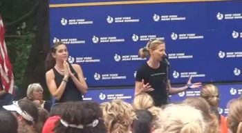Mary Wittenberg on stage with Kara Goucher before NYRR mini