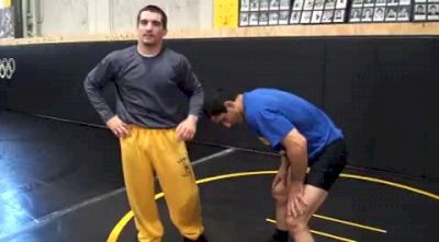 Front headlock to ankle pick