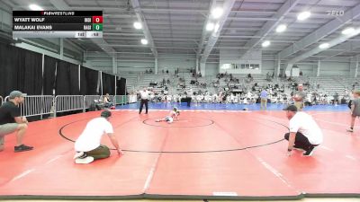 52 lbs Rr Rnd 3 - Wyatt Wolf, Indiana Outlaws Green vs Malakai Evans, Ragin Raisins Fredonia ES