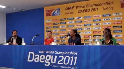 Melaine Walker battling through running in lane 8 Daegu 2011 World Championships