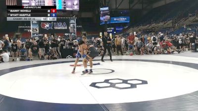 113 lbs Champ. Rd Of 16 - Manny Novelli, Alaska vs Wyatt Hueftle, Nebraska