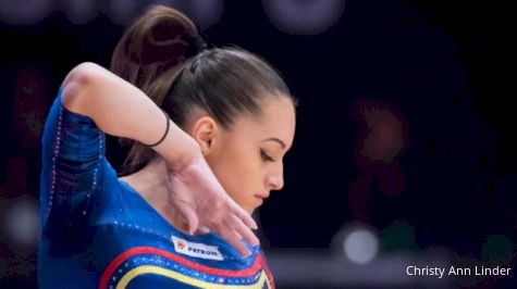 Day 5: Romania Crumbles In Qualifications, Russia Finishes First, Black Leads AA