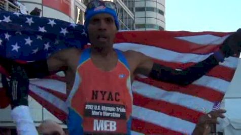 Meb Keflezighi raised up by his father after win