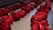 Becky Downie Returns To England, Fails to Find Luggage in Sea of Red Bags