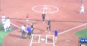 Softball Umpire, Knocked Over By Slide, Calls Runner Safe