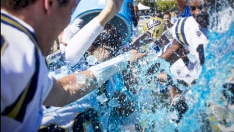Miss Val Wins As UCLA Honorary Football Coach, Gets First Powerade Bath
