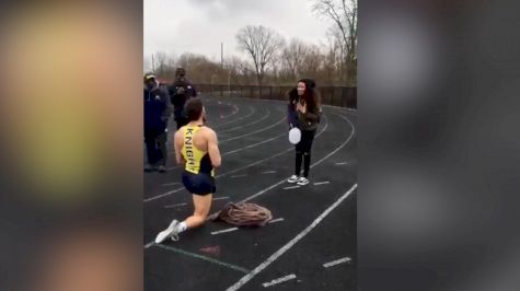 Runner Proposes At Track Meet
