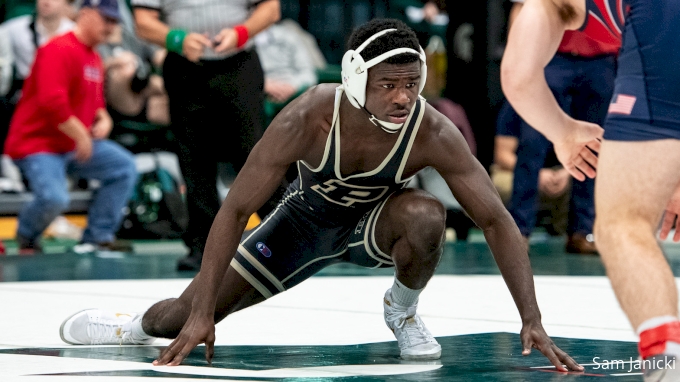 Kendall Coleman wrestling against the Badgers