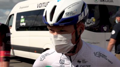 Battered Froome Survives Stage 2
