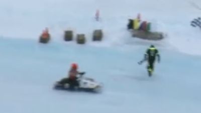 Snowmobile Nearly Runs Down Flagman At Eagle River
