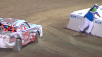 Official Jumps Over Wall To Avoid Spinning Car At Merced Speedway