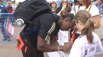 Winner Yohan Blake after his race with the fans