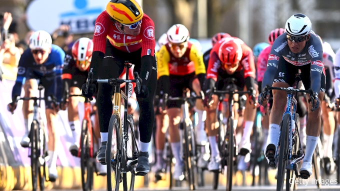 Race winner Soren Waerenskjold of Norway and Team Uno-X Mobility and Jasper Philipsen of Belgium and Team Alpecin-Deceuninck sprint at finish line during the 80th Omloop Het Nieuwsblad 2025