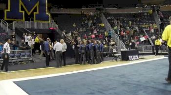 Athletic Director Dave Brandon congratulates Michigan Gymnasts on success