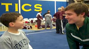 William and Mary's JJ Jindra tells 9-year-old reporter, Cristian Vazquez, how his team did at the Navy Open