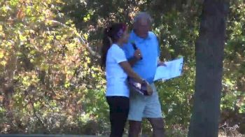 Chico State's Ayla Granados talks with Dixon Farmer after her individual title at 2013 CCAA XC Championships