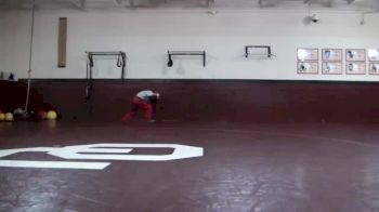 Oklahoma wrestlers warming up in their room pre Bedlam