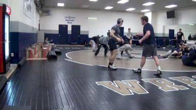 Pitt Panters working out in a back room