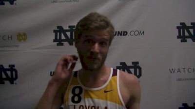 Alex Baker of Loyola PRs for first in the 5k