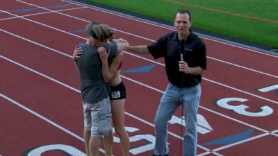 Emotional coach and athlete after going from 2:07 to 1:59 in one year