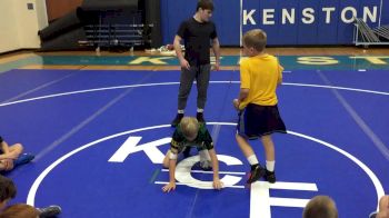 Joey McKenna Working With Campers On Arm Bars