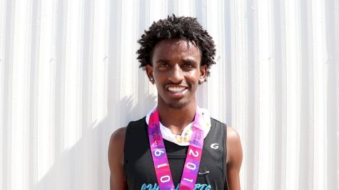 Maddon Muhammad runs 4:02 to win 15-16 1500m