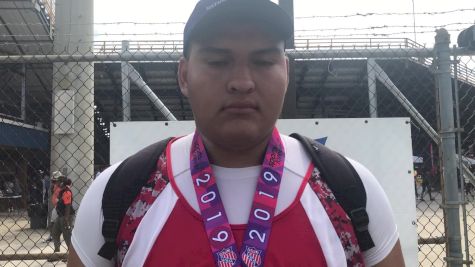 Angel Robles wins 17-18 M Shot Put