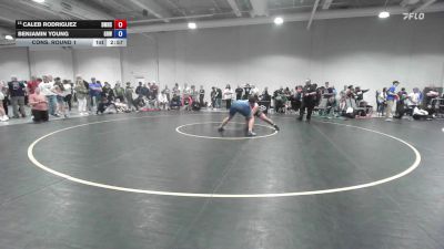 125 lbs Cons. Round 1 - Caleb Rodriguez, Bishop McCort High School Wrestling vs Benjamin Young, Gold Rush Wrestling