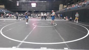 285 lbs Cons. Round 4 - Wilbert Martin, Texas Wesleyan vs Rio Gomez, Newman