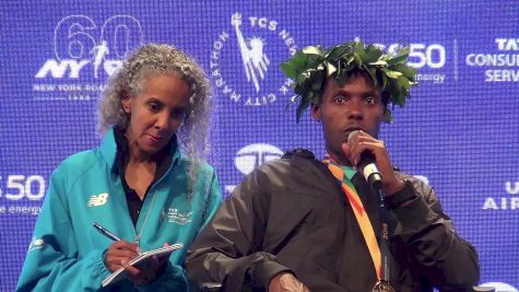 Lelisa Desisa reacts to his winning time