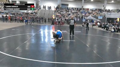 A 138 lbs Champ. Round 1 - Cypress Guidry, Martin Luther King High School vs Aiden Oswald, Station Camp High School