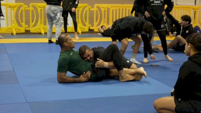 Grappling Legend 'Jacare' Sousa Helps Student Warm Up At No-Gi Pans