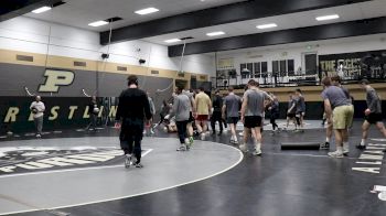 Coach Ersland Brings In The Boilermakers After Their Last Practice Before Iowa